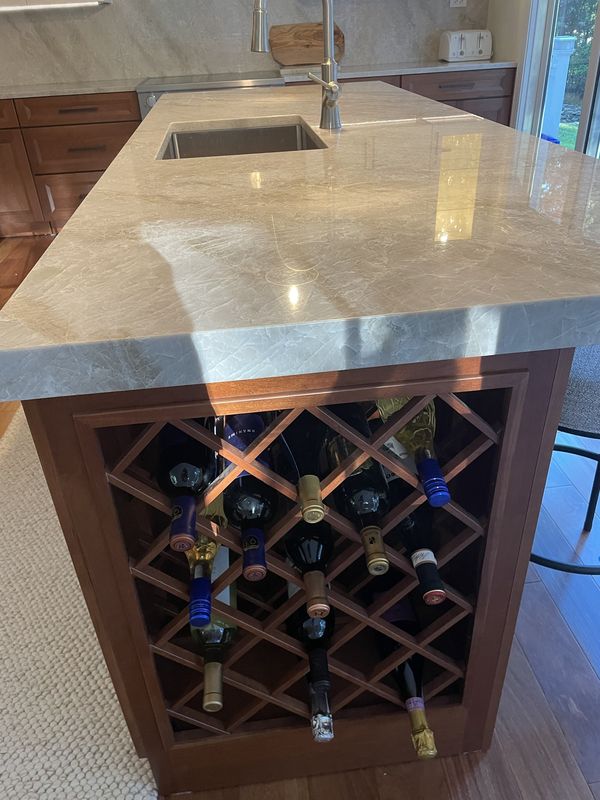Built-in diagonal wine rack at the end of the island